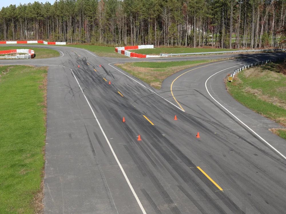 A car on a defensive-driving training track